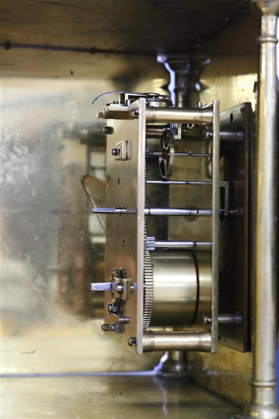 A lantern clock with later movement